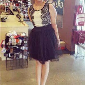 Dress size M white and black with tulle and lace.